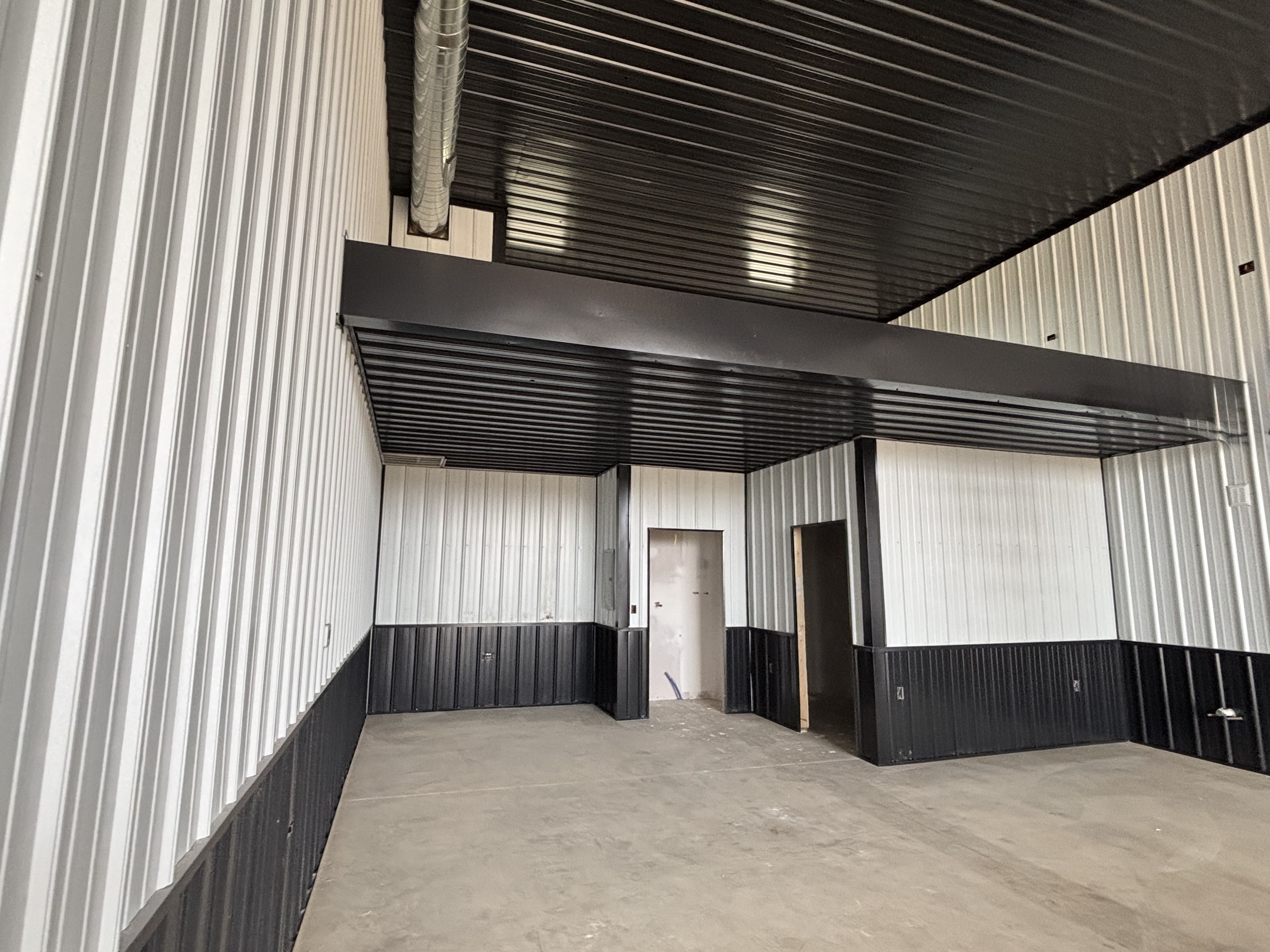 Site work — siding installation in progress